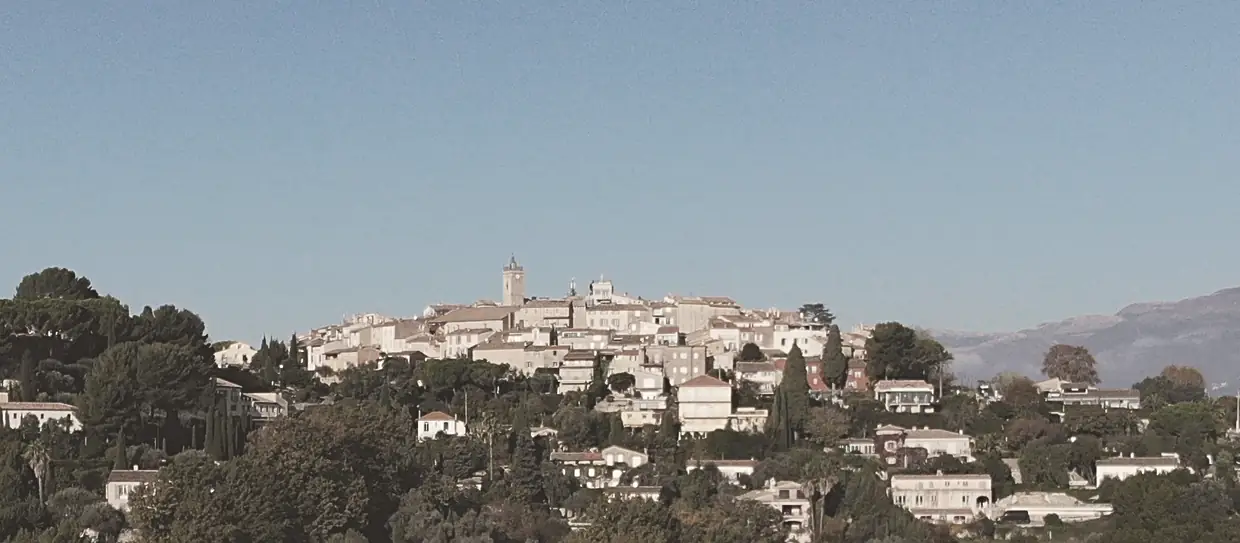 A view of the old village of Mougins (France), surrounded by luxury villas